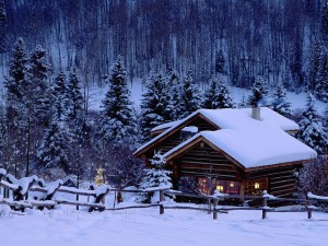 log cabin in snow